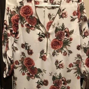 Beautiful floral blouse with gold zipper